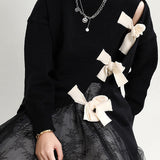 Angela | Οργανικό Μαύρο Πλεκτό Φθινοπωρινό Πουλόβερ με Στρογγυλή Λαιμόκοψη και Ασύμμετρο Σχέδιο Patchwork (Organic Black O-Neck Patchwork asymmetrical design Fall Knit Knitted sweaters)