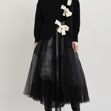 Angela | Οργανικό Μαύρο Πλεκτό Φθινοπωρινό Πουλόβερ με Στρογγυλή Λαιμόκοψη και Ασύμμετρο Σχέδιο Patchwork (Organic Black O-Neck Patchwork asymmetrical design Fall Knit Knitted sweaters)