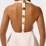 Υβόννη Μίνι Φόρεμα με Δετό Λαιμό, Ανοιχτή Πλάτη και Λουλουδάτη Λεπτομέρεια