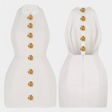 Υβόννη Μίνι Φόρεμα με Δετό Λαιμό, Ανοιχτή Πλάτη και Λουλουδάτη Λεπτομέρεια